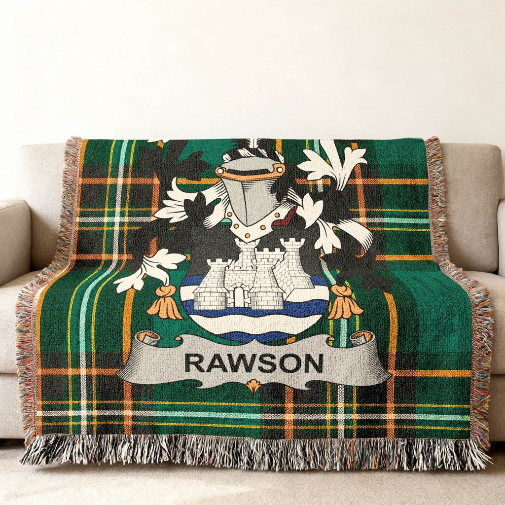 Green plaid throw blanket featuring the Rawson family crest with a castle and shield.