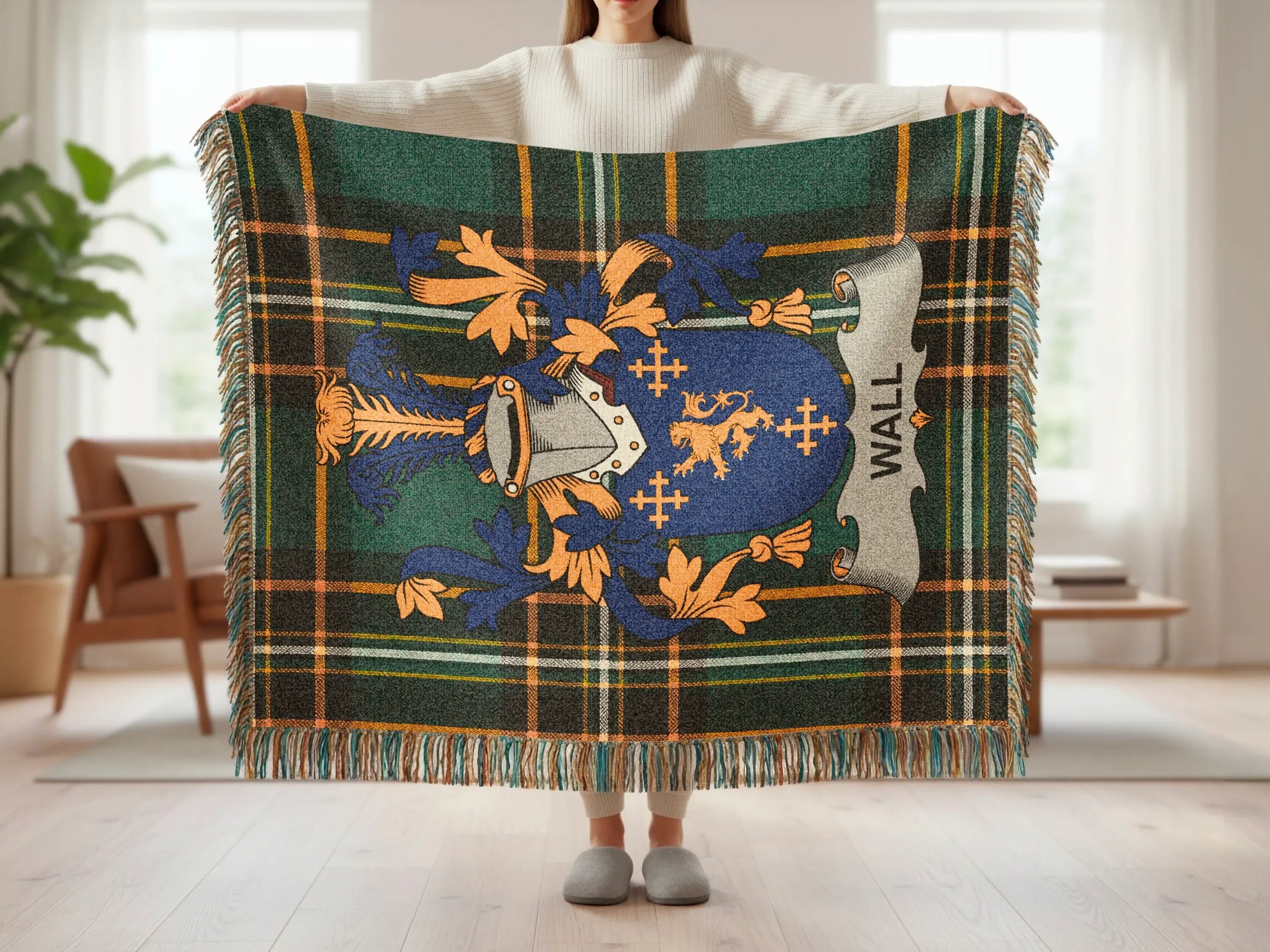 Tartan blanket featuring a coat of arms with the text "WALL".