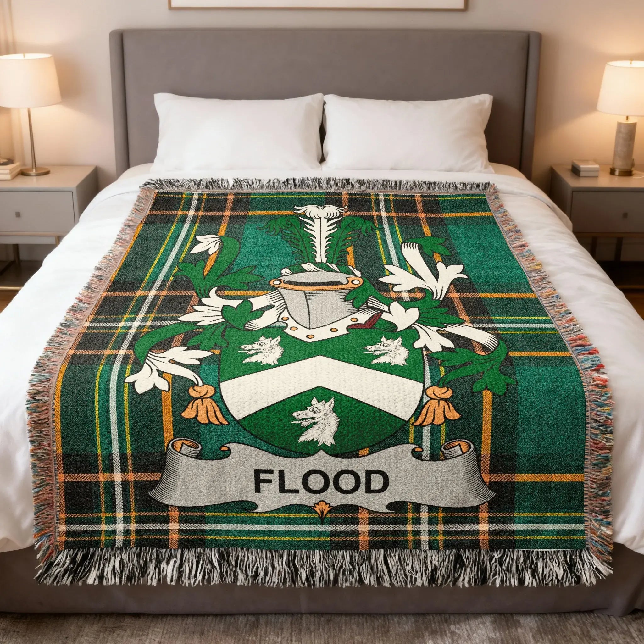 Green plaid throw blanket featuring the Flood family crest in the center.