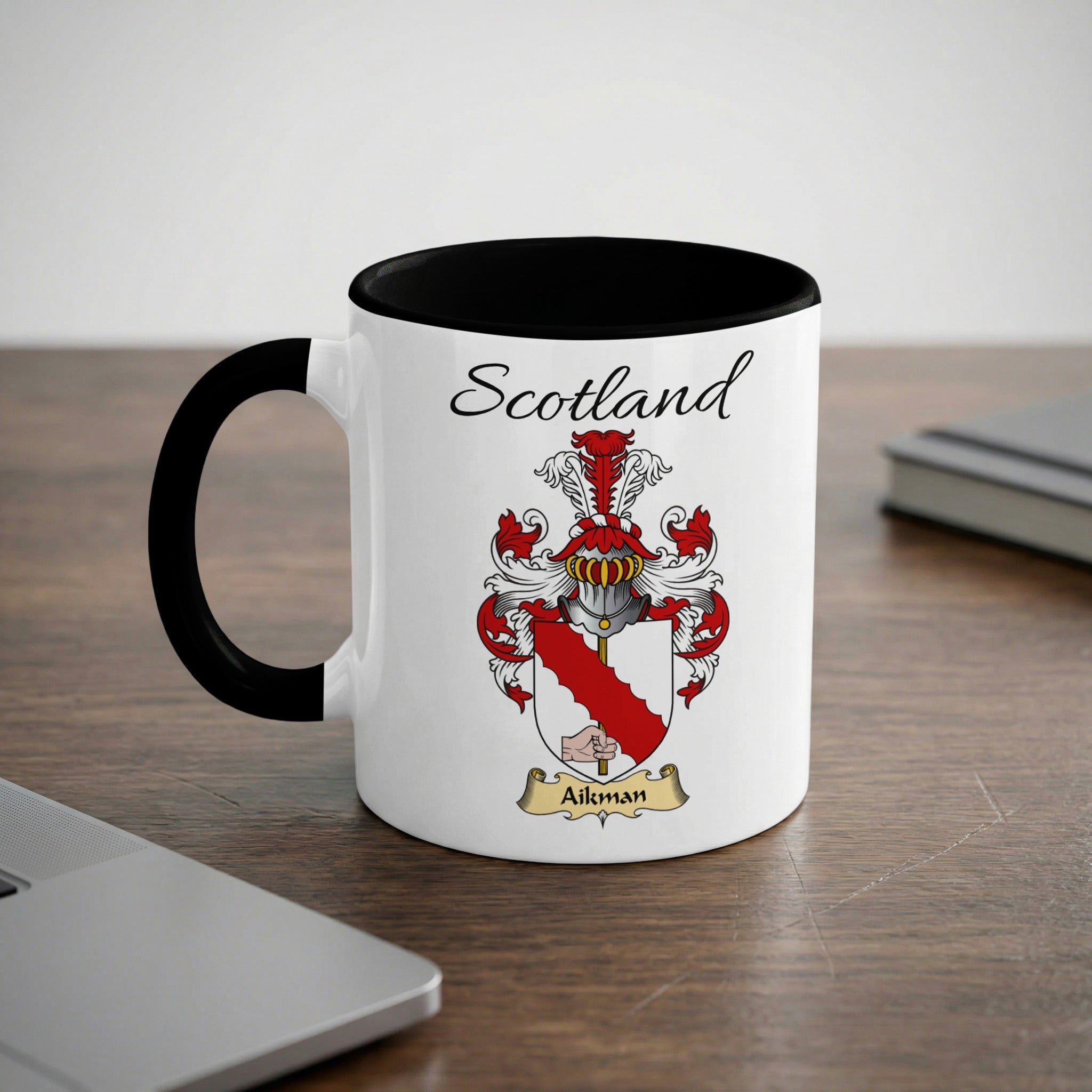 Aikman Scottish family crest accent mug with Scotland lettering and coat of arms artwork