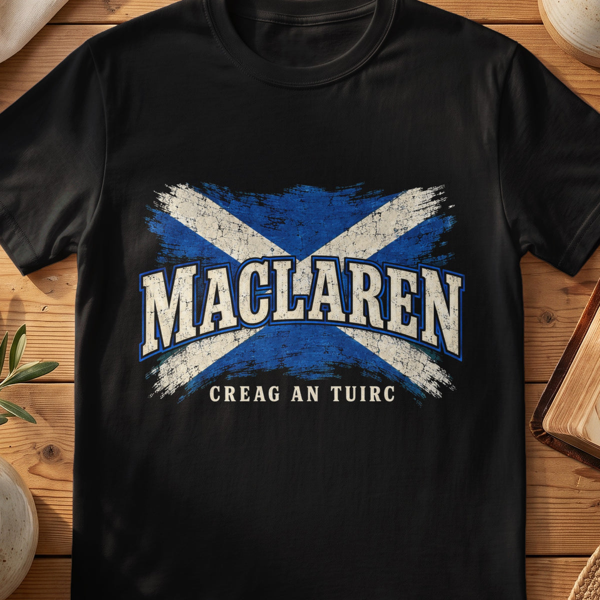 MacLaren Scottish Saltire T-shirt in Black, with distressed blue and cream flag and “Creag an Tuirc” lettering.