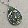 Lammie clan Scottish tartan necklace with clan crest and Per Varios Casus motto on tartan background