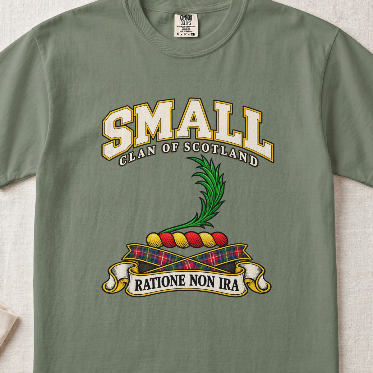Small Scottish clan T-shirt in Moss, front view with a green leafy frond and motto banner.