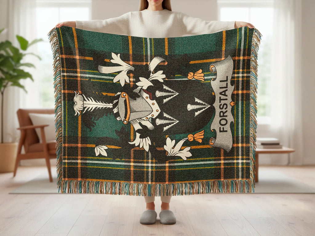 Green tartan blanket with white heraldic crest and "FORSTALL" text.