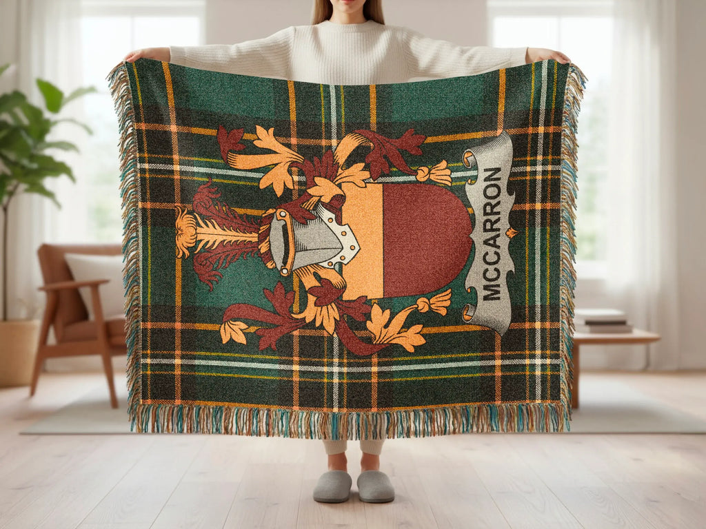 Tartan blanket with McCARRON coat of arms displayed.