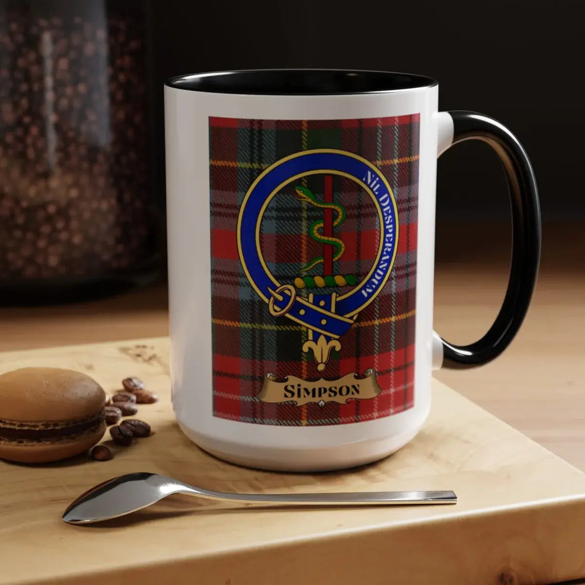 Close-up of the Simpson clan crest printed on a ceramic mug
