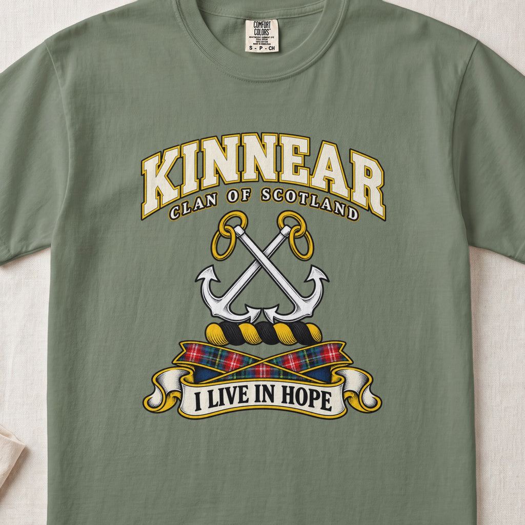 Kinnear Scottish clan T-shirt in Moss, front view with crossed silver anchors and motto design.