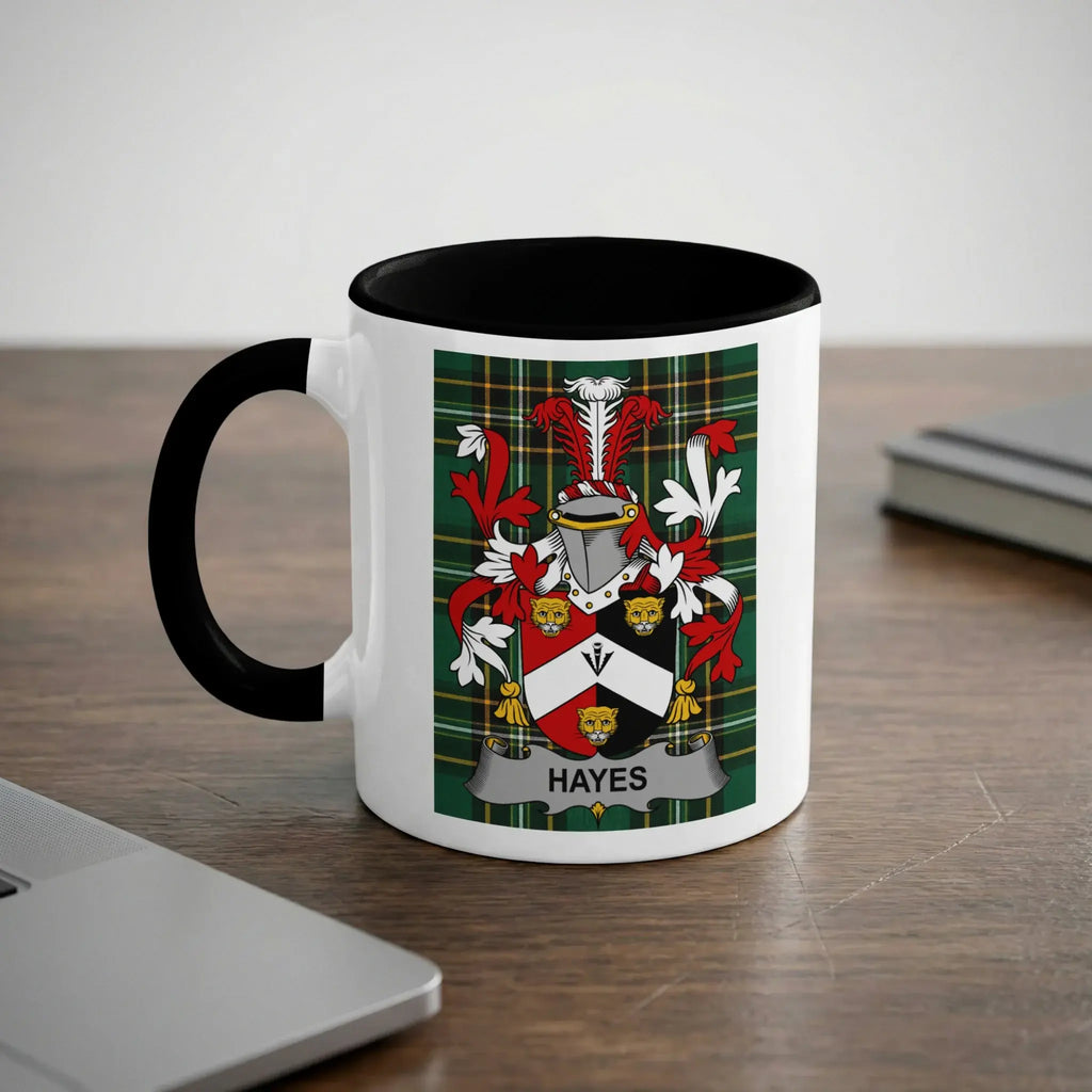 White mug with black rim and handle featuring the Hayes family crest.