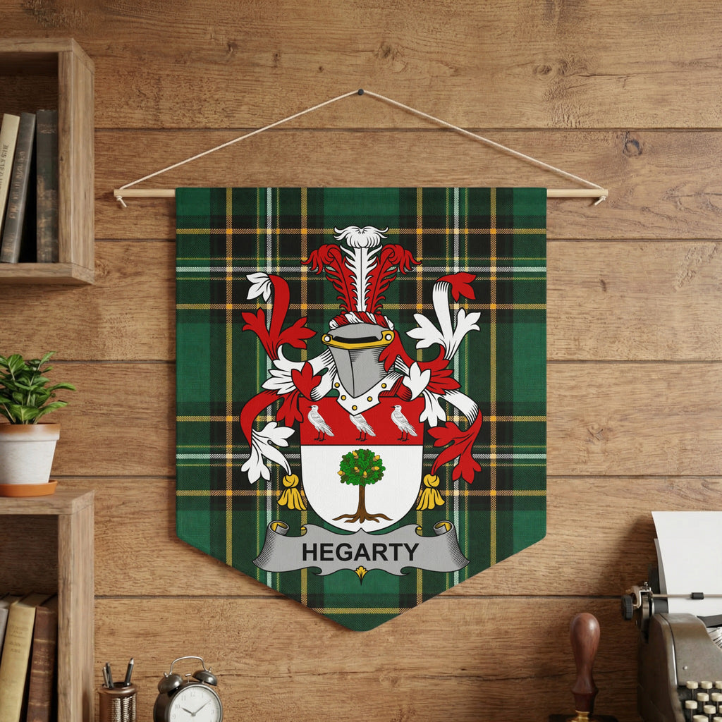 Hegarty family crest on a green plaid banner with a tree and birds.