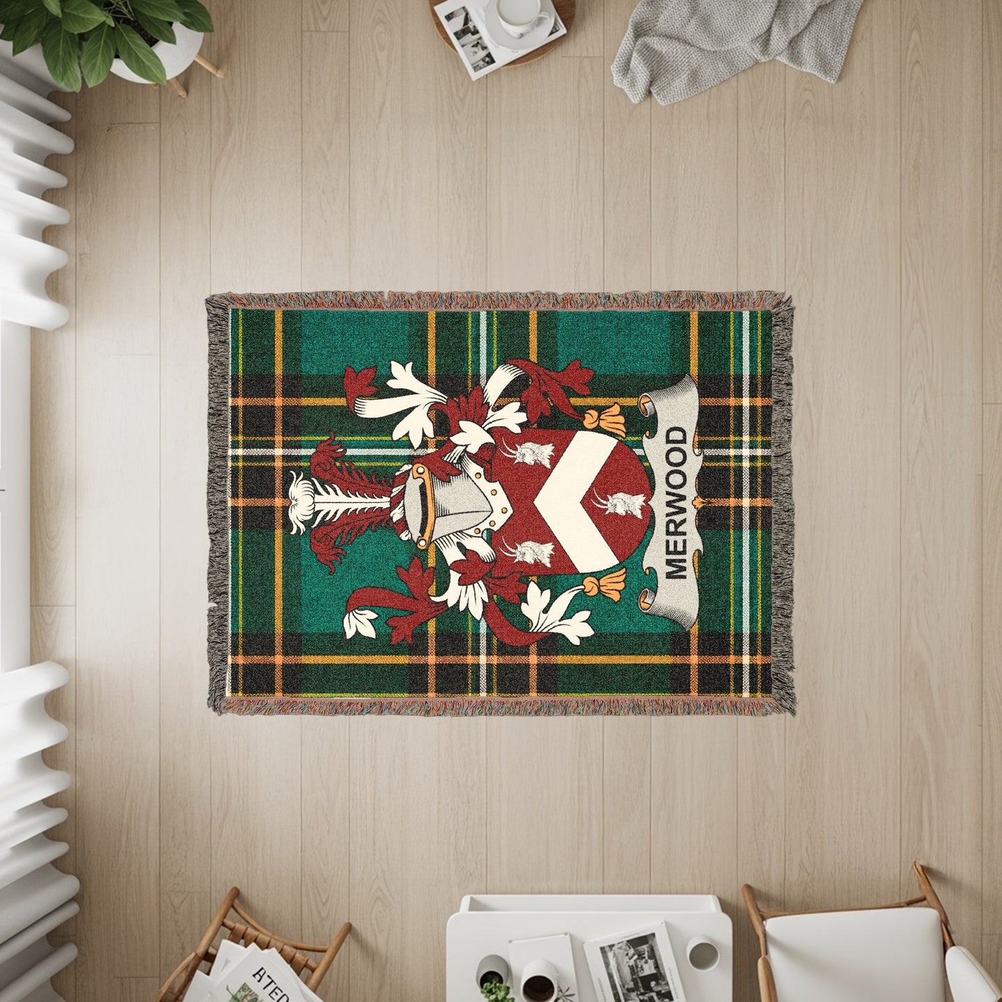 Merwood family crest on tartan plaid woven throw blanket.