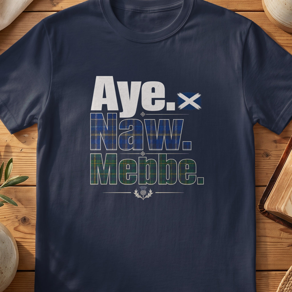 Navy Gildan 64000 unisex T-shirt flatlay with Aye Naw Mebbe Scottish graphic design
