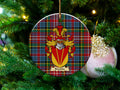 Brechin Scottish clan ceramic ornament with family crest on a Caledonia tartan background, hanging on a Christmas tree