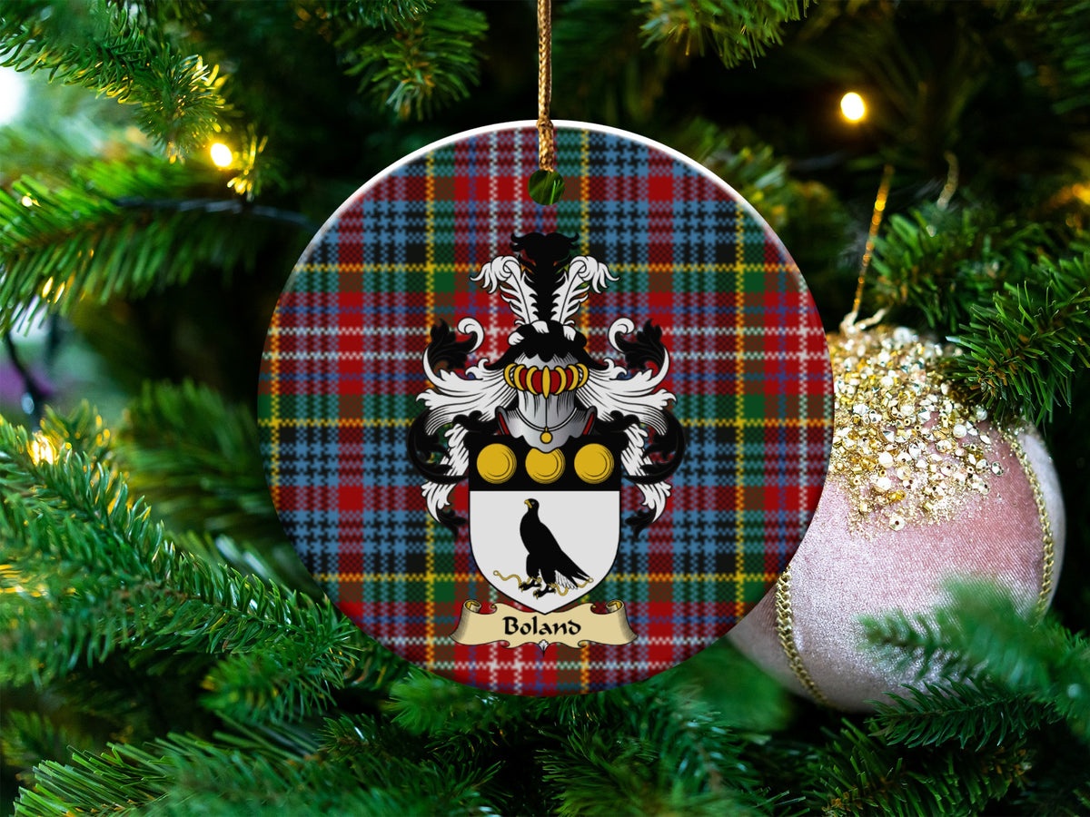 Boland Scottish clan ceramic ornament with family crest on a Caledonia tartan background, hanging on a Christmas tree