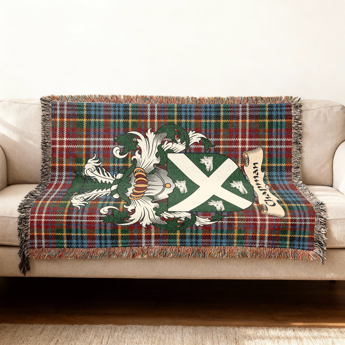 Chapman Scottish woven blanket with family shield and Caledonia tartan background