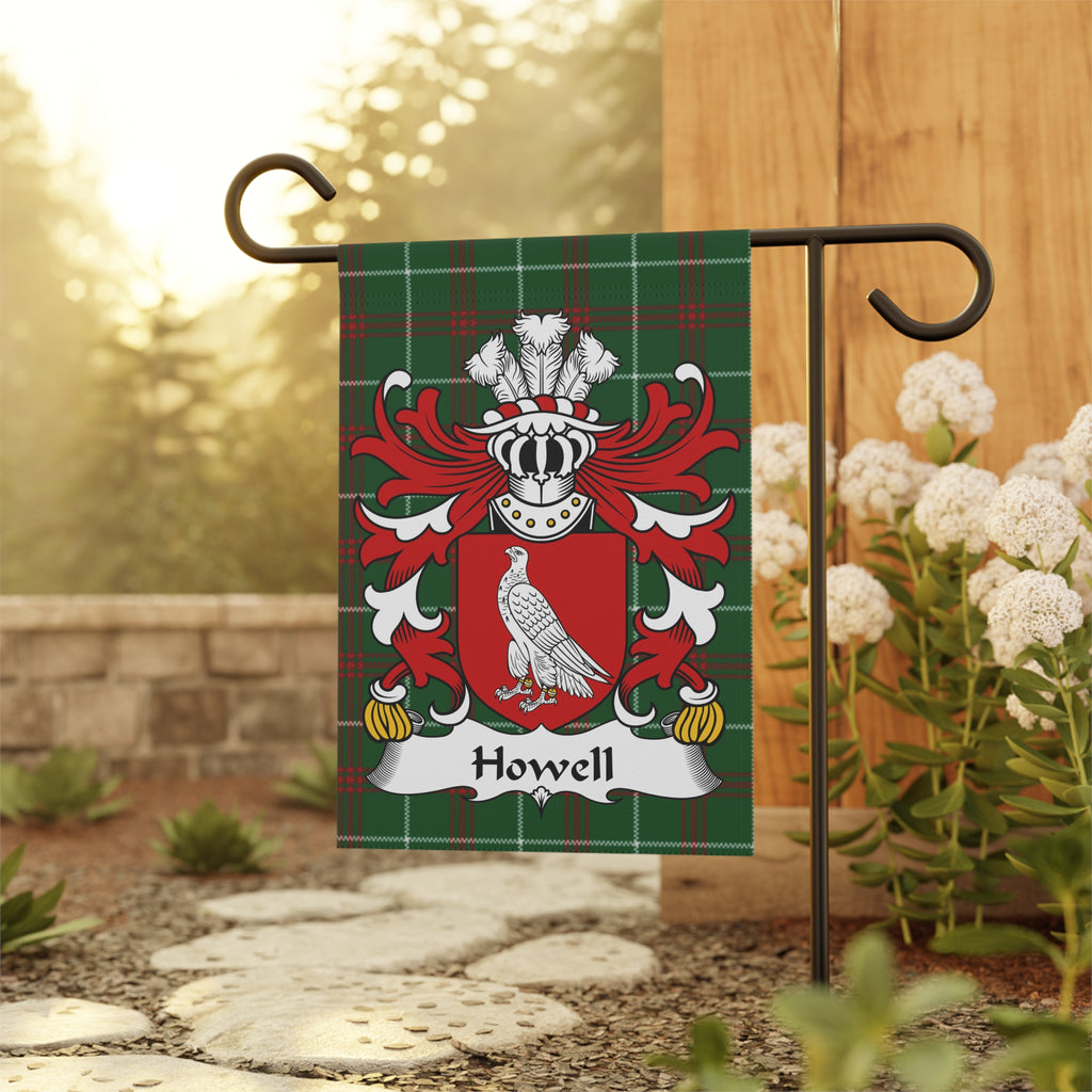 Howell family crest displayed on a green plaid garden flag.