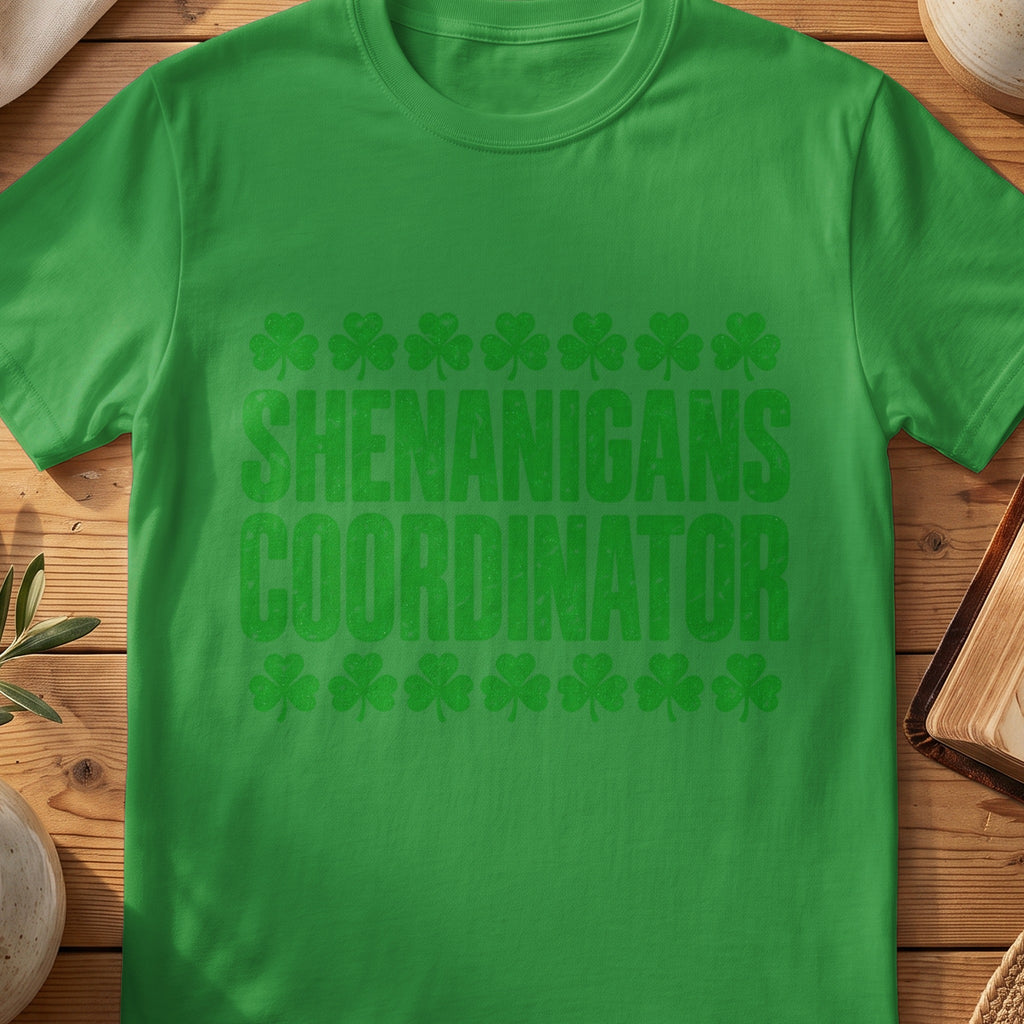 Green funny Irish T-shirt with “Shenanigans Coordinator” text and shamrocks.
