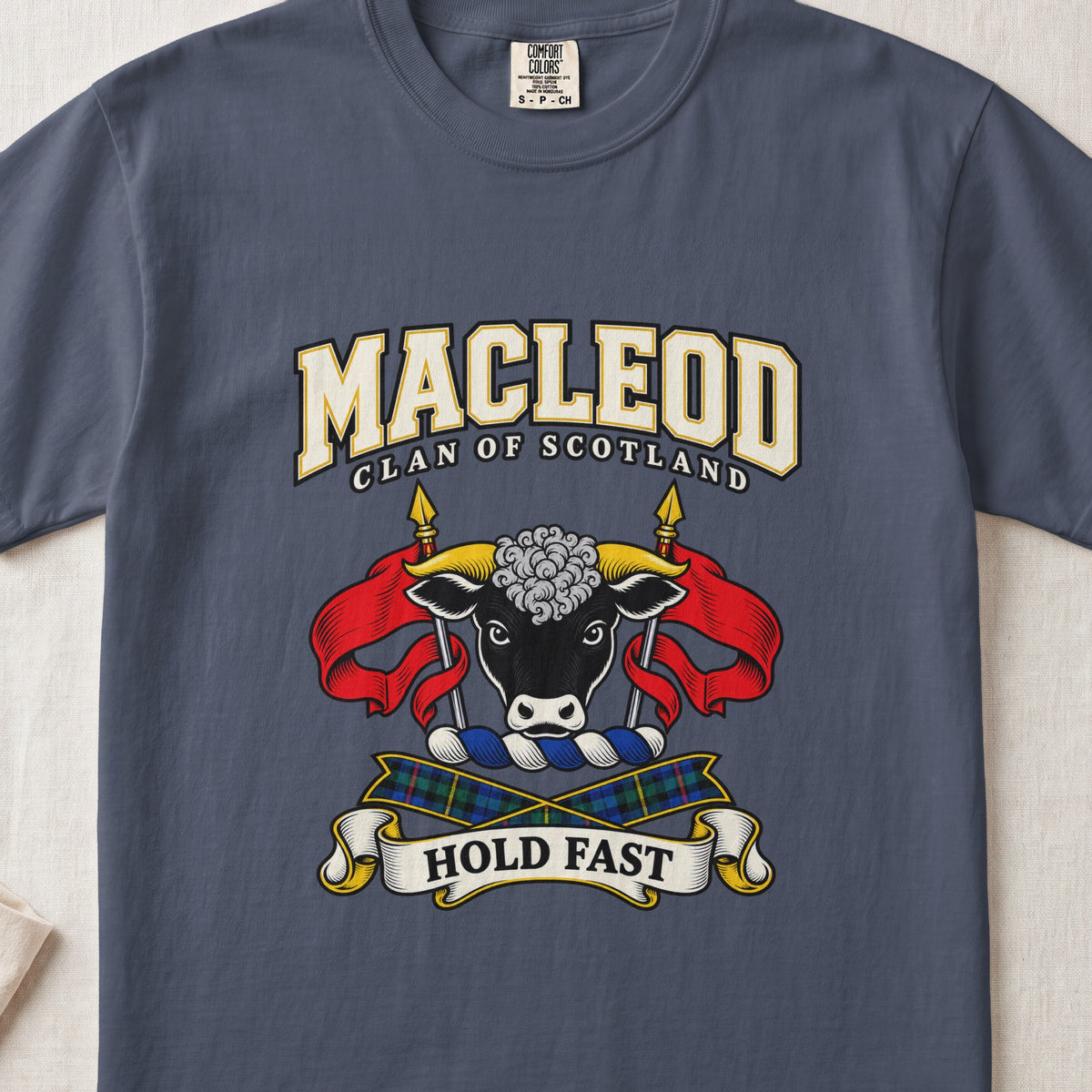 MacLeod graphic T-shirt in Midnight blue, front flat lay showing varsity lettering and black bull head with gold horns and white forehead curls.