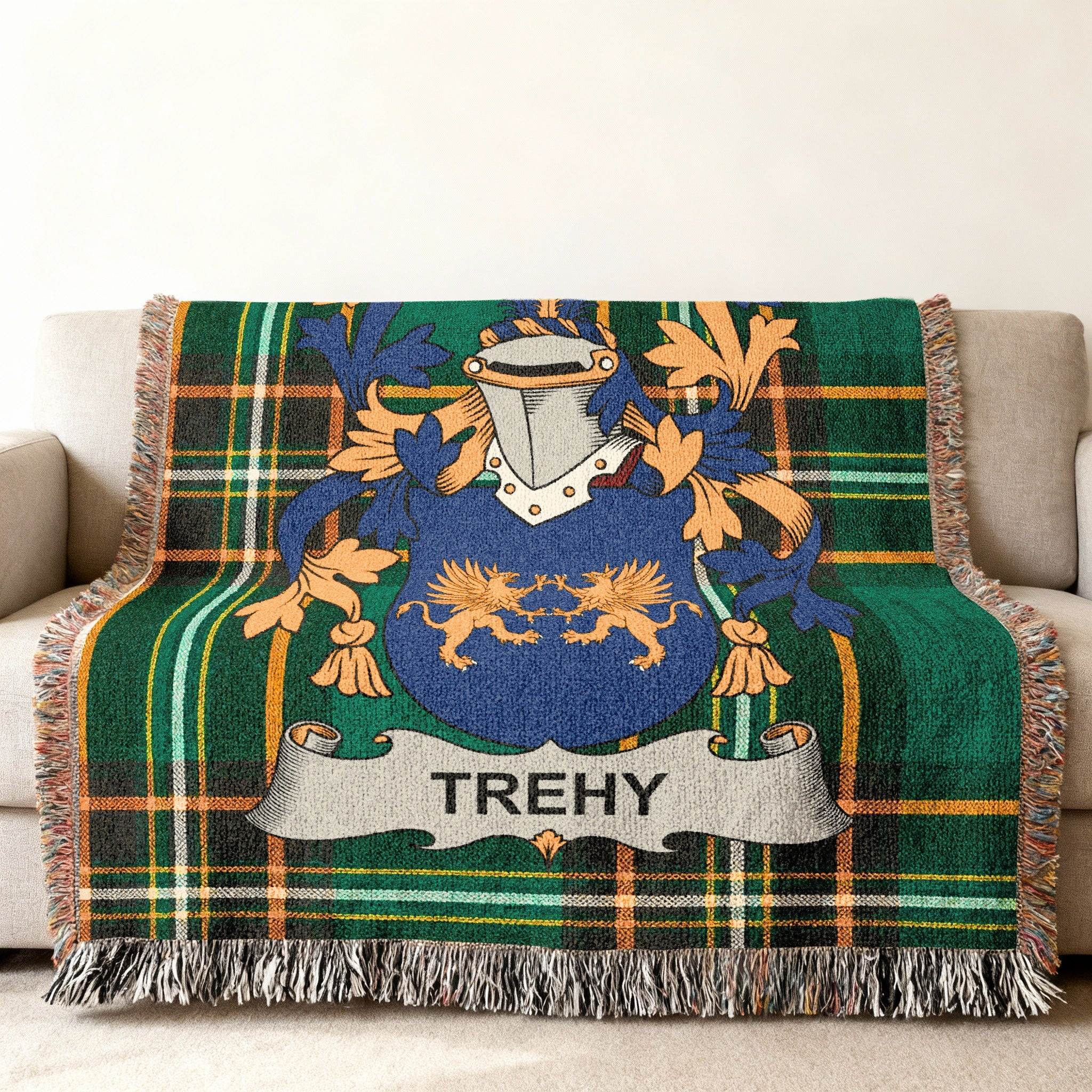 Tartan throw blanket with Trehy family crest featuring two lions.