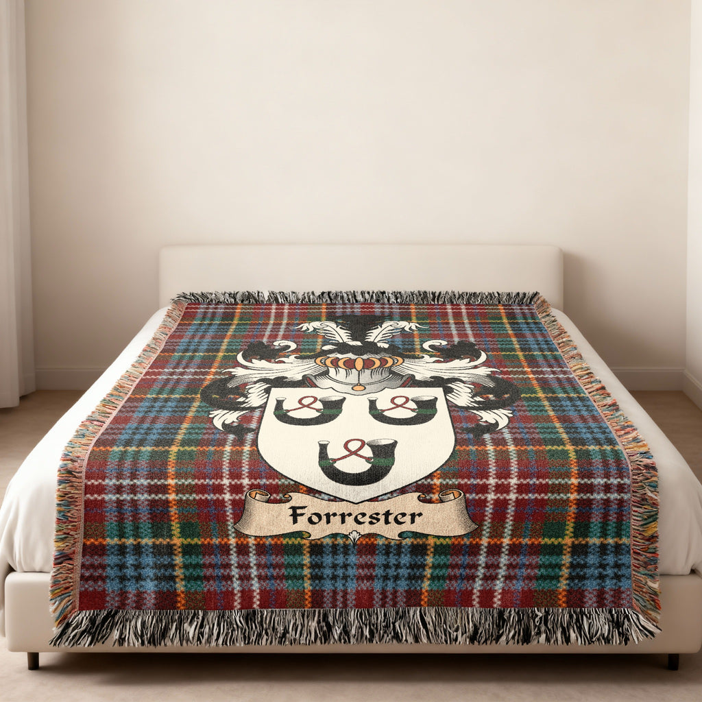 Forrester Scottish family shield woven blanket on a Caledonia tartan background