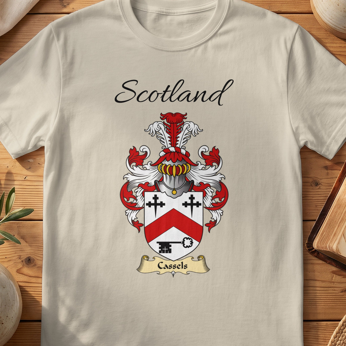 Sand Cassels Scottish family shield T-shirt featuring a red chevron with black crosses and a key