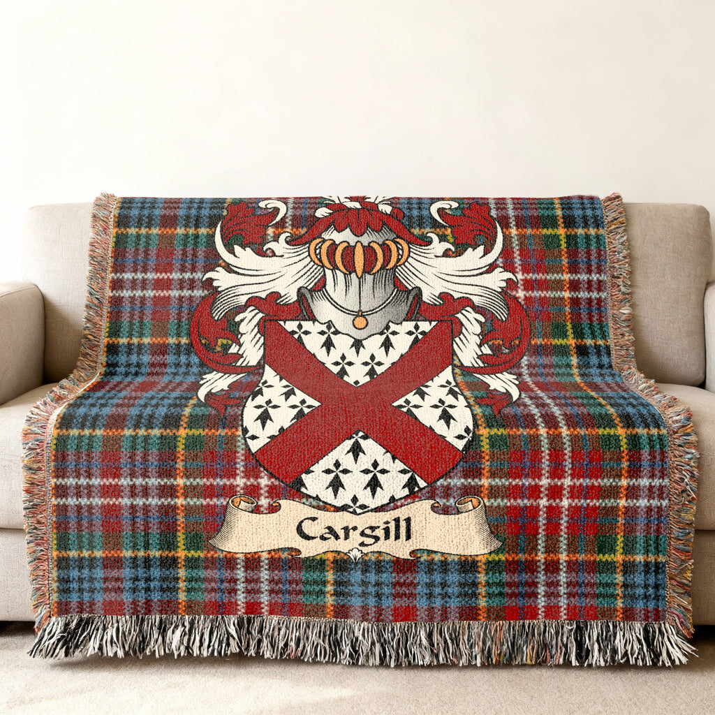 Cargill family crest emblem on a Caledonia tartan woven blanket