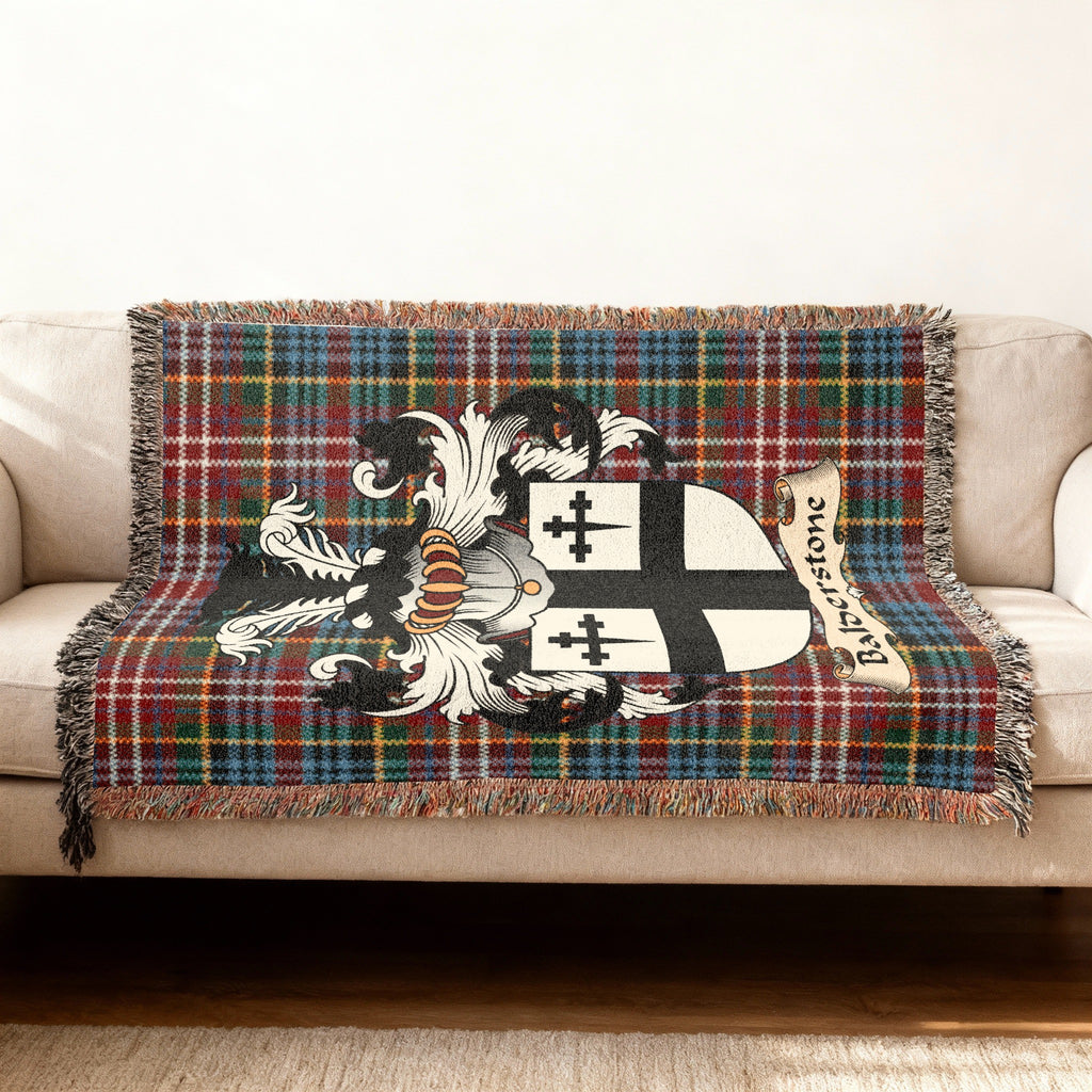 Balderstone Scottish woven blanket with family shield and Caledonia tartan background