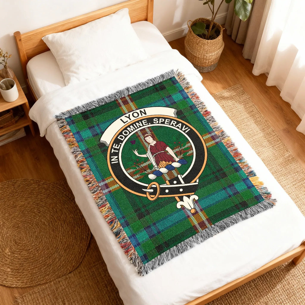 Clan Lyon In Te Domine Speravi woven blanket — folded showing fringe detail and crest on tartan