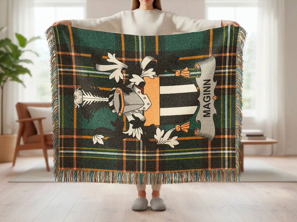 Tartan blanket with family crest featuring MAGINN text.