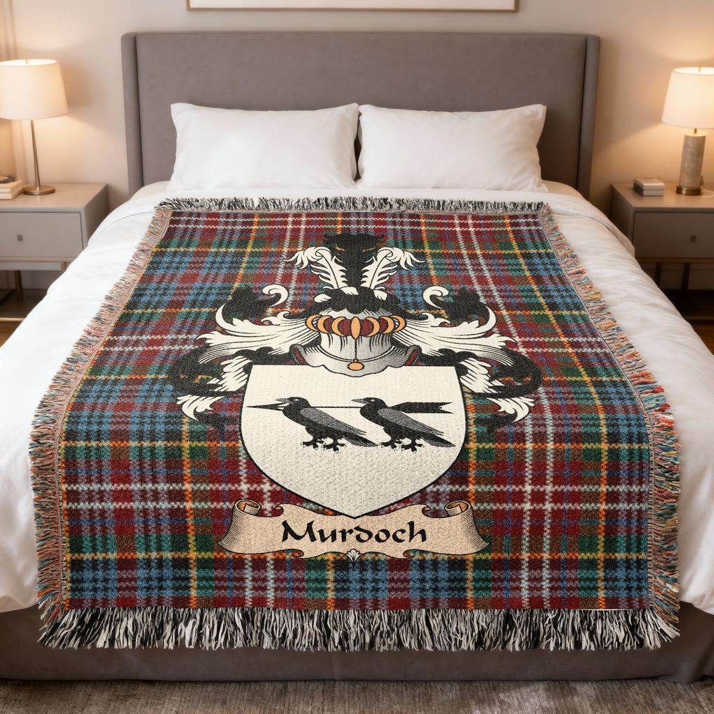 Murdoch family crest emblem on a Caledonia tartan woven blanket