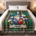 Tartan blanket with Trant coat of arms and name.