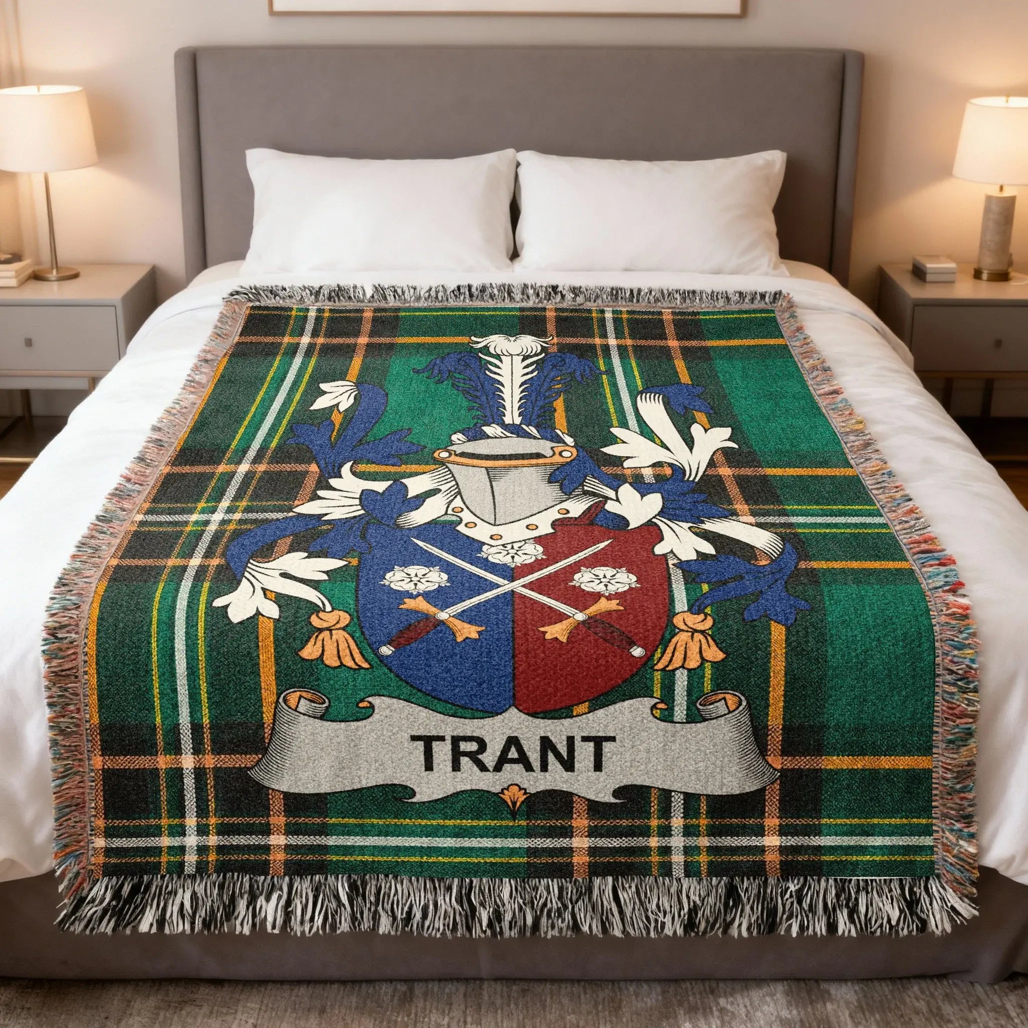 Tartan blanket with Trant coat of arms and name.