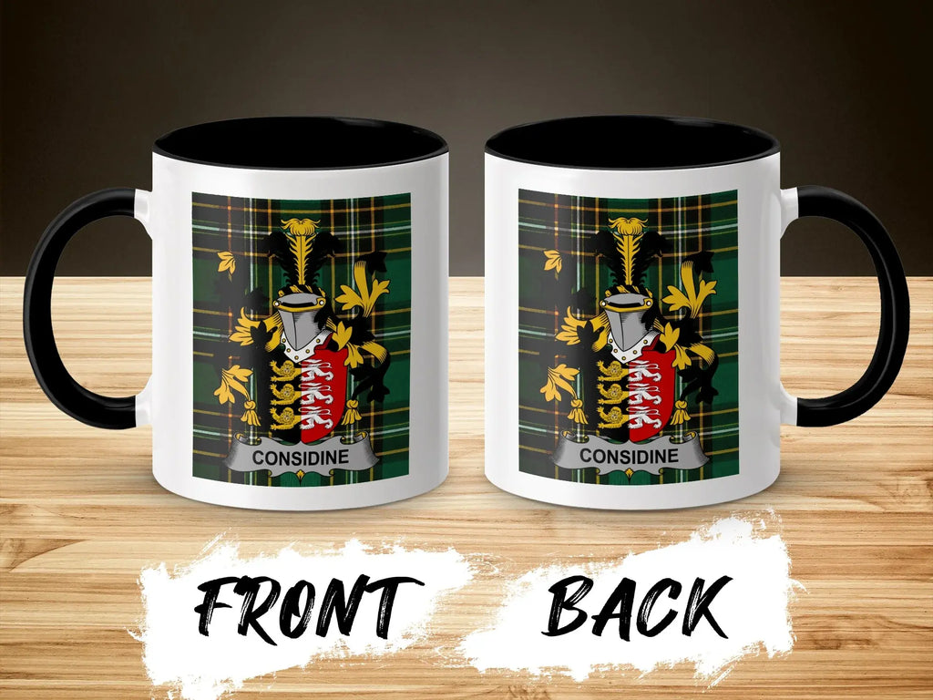 Two mugs displaying a family crest with the name "CONSIDINE" on a wooden surface.