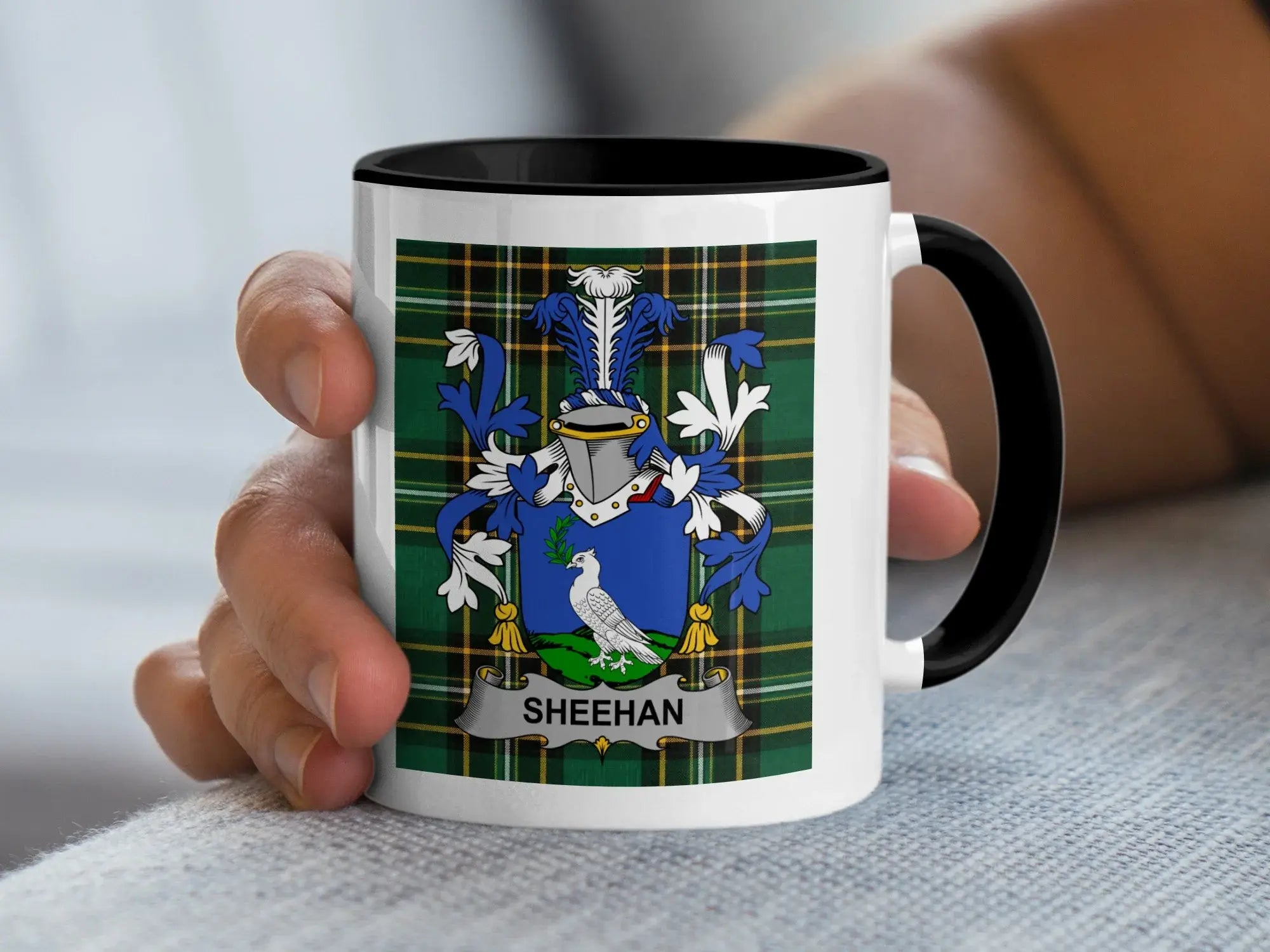 Sheehan Irish family crest black accent mug with Irish National Tartan