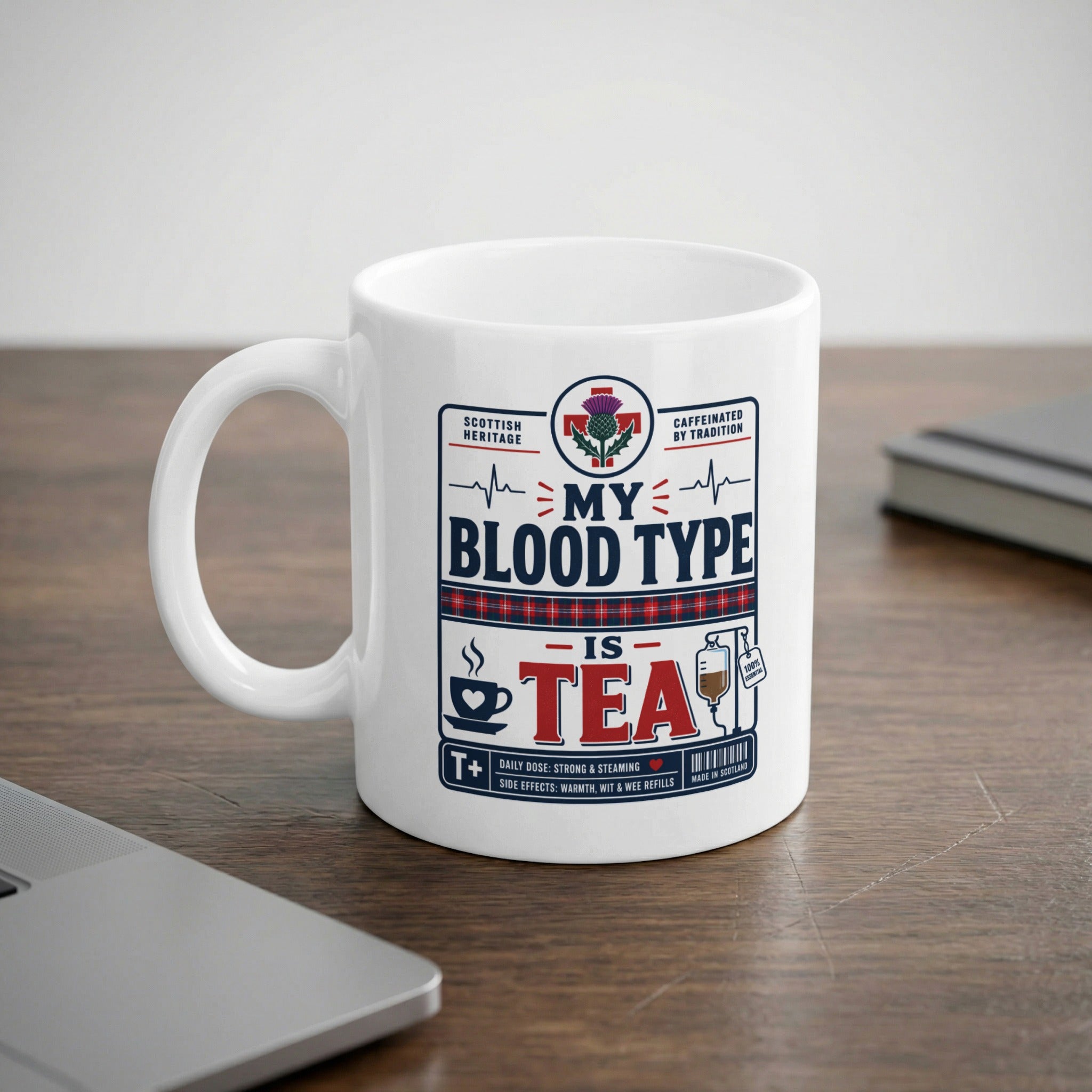 Scottish Heritage "My Blood Type Is Tea" mug with thistle and caffeine label.