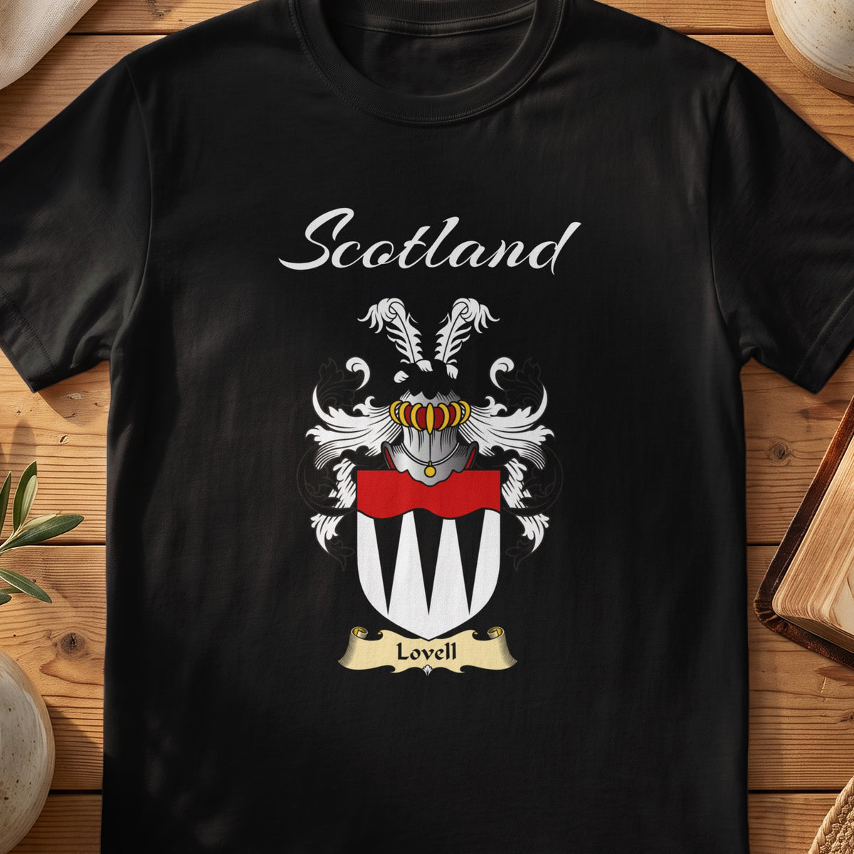 Black Lovell Scottish T-shirt featuring a black-and-white pointed pattern beneath a red band