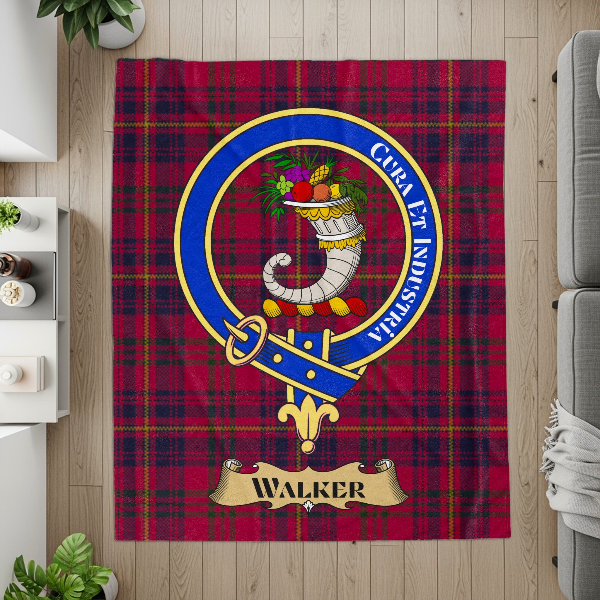 Walker crest and motto on red tartan printed throw — flat lay detail