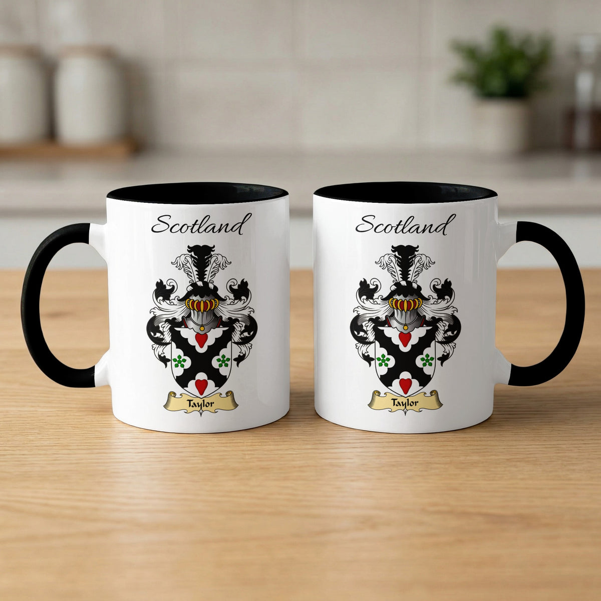 Pair of white Taylor Scottish family shield mugs with black accents
