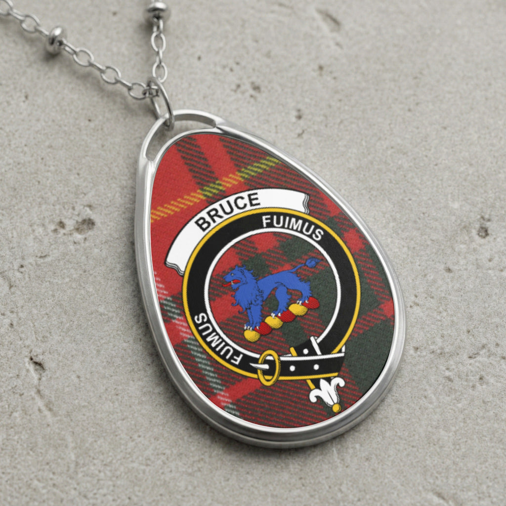 Bruce clan Scottish tartan necklace with clan crest and Fuimus motto on tartan background