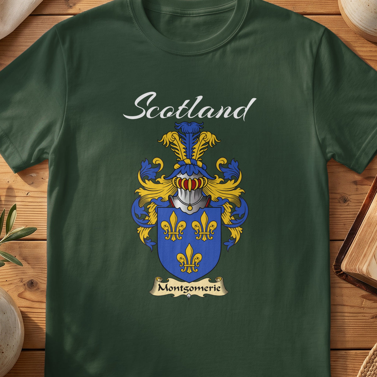 Forest Green Montgomerie Scottish T-shirt featuring three gold fleurs-de-lis on a blue shield