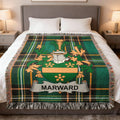 Tartan throw blanket with MARWARD crest in green, orange, and gold.