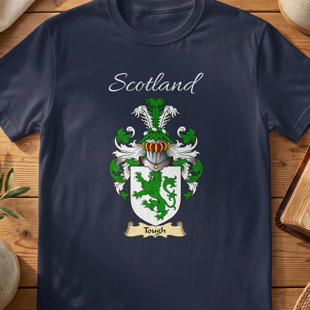 Navy Tough heritage T-shirt laid flat with “Scotland” and the colourful family shield design.