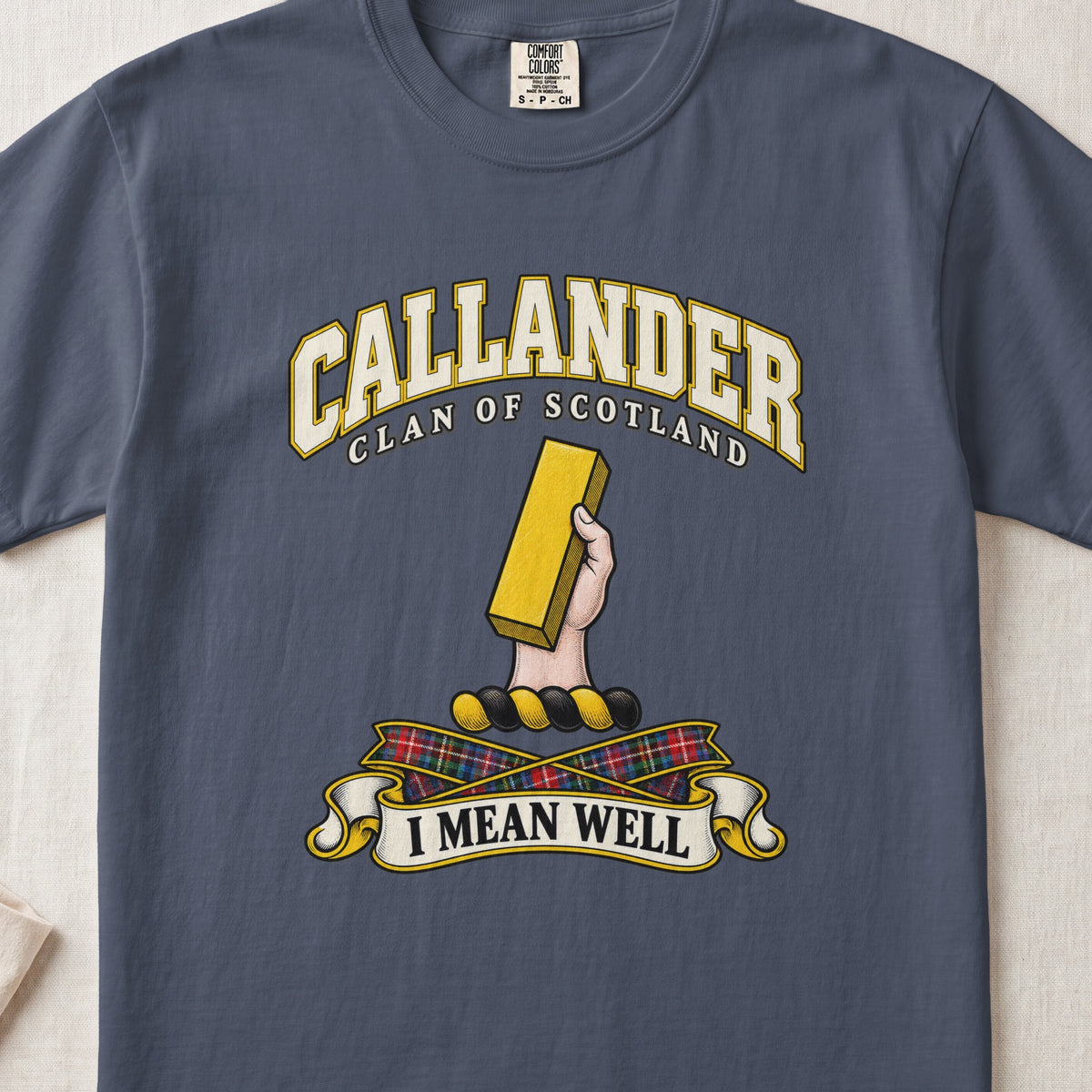 Callander Scottish clan T-shirt in Midnight, front view with a hand holding a gold rectangular bar and motto design.