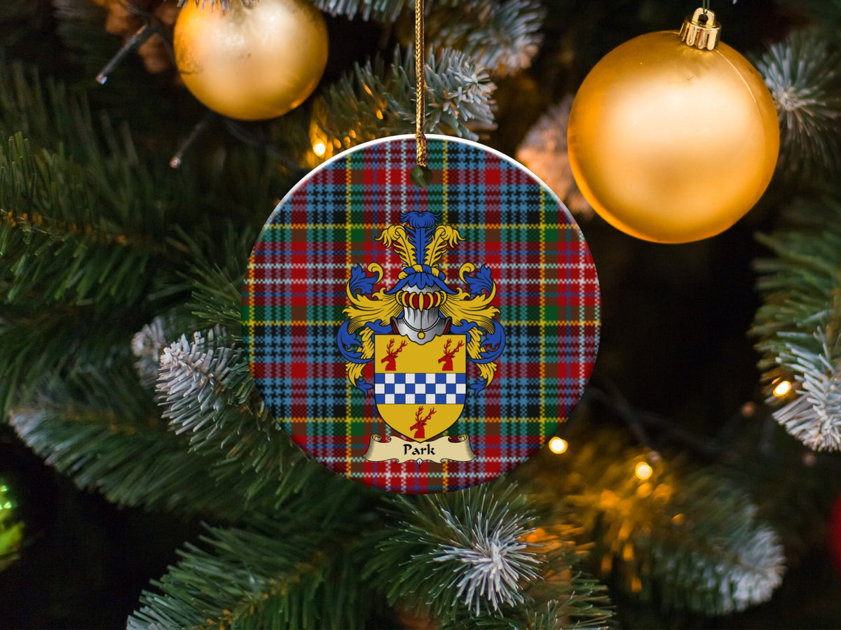 Park family emblem ceramic Christmas ornament with Caledonia tartan background in festive holiday décor