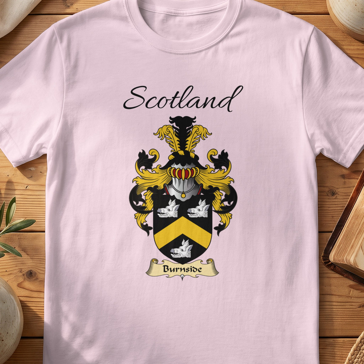 Light Pink Burnside Scottish family shield T-shirt featuring a gold chevron between pale floral motifs on black