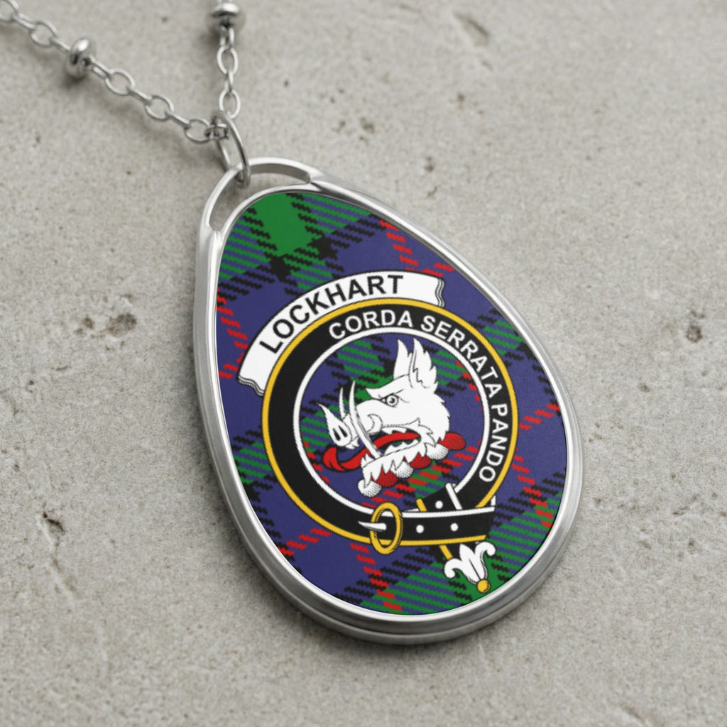 Lockhart clan Scottish tartan necklace with clan crest on tartan background
