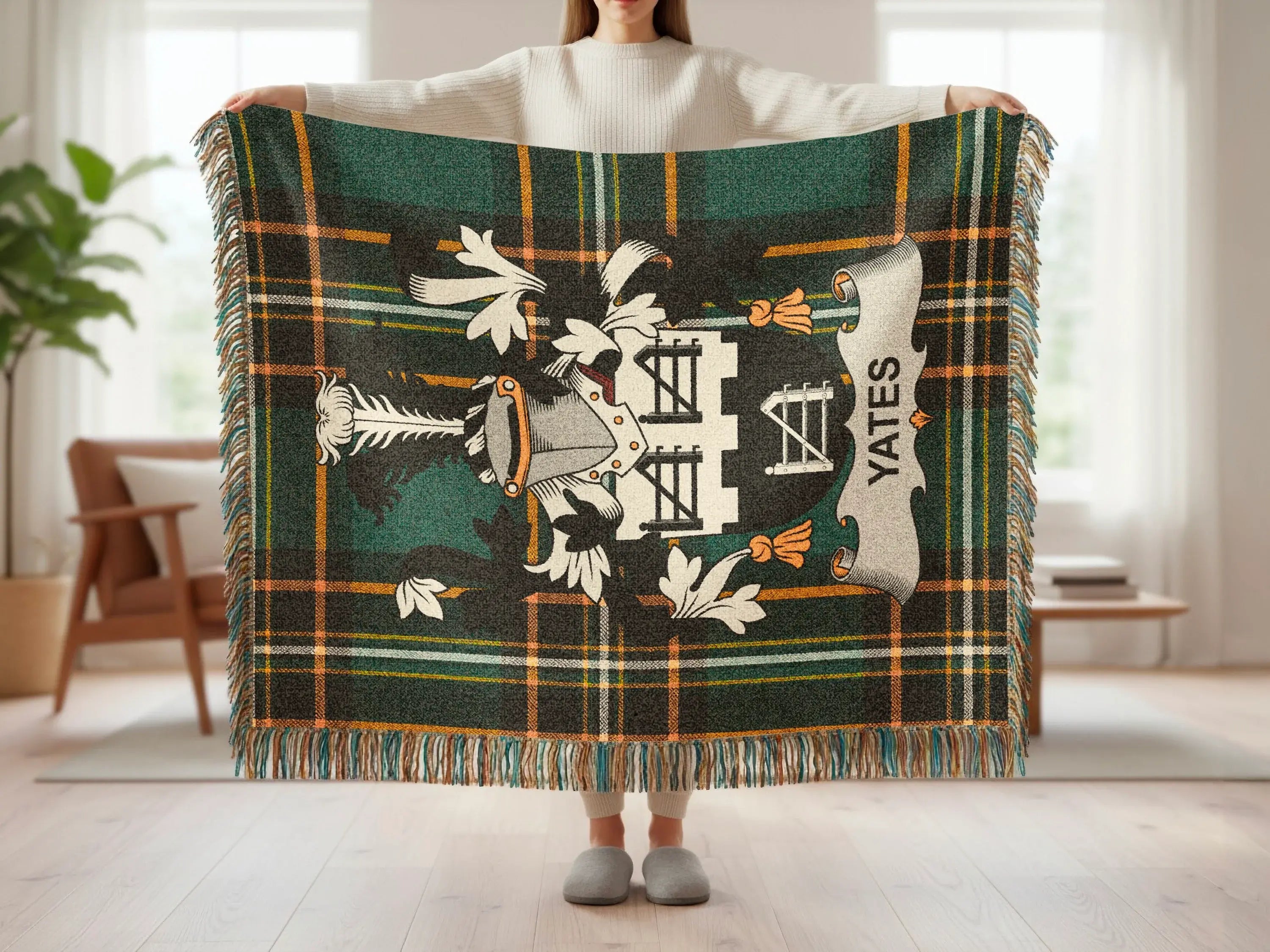 Tartan throw blanket with clan crest and "Yates" banner.