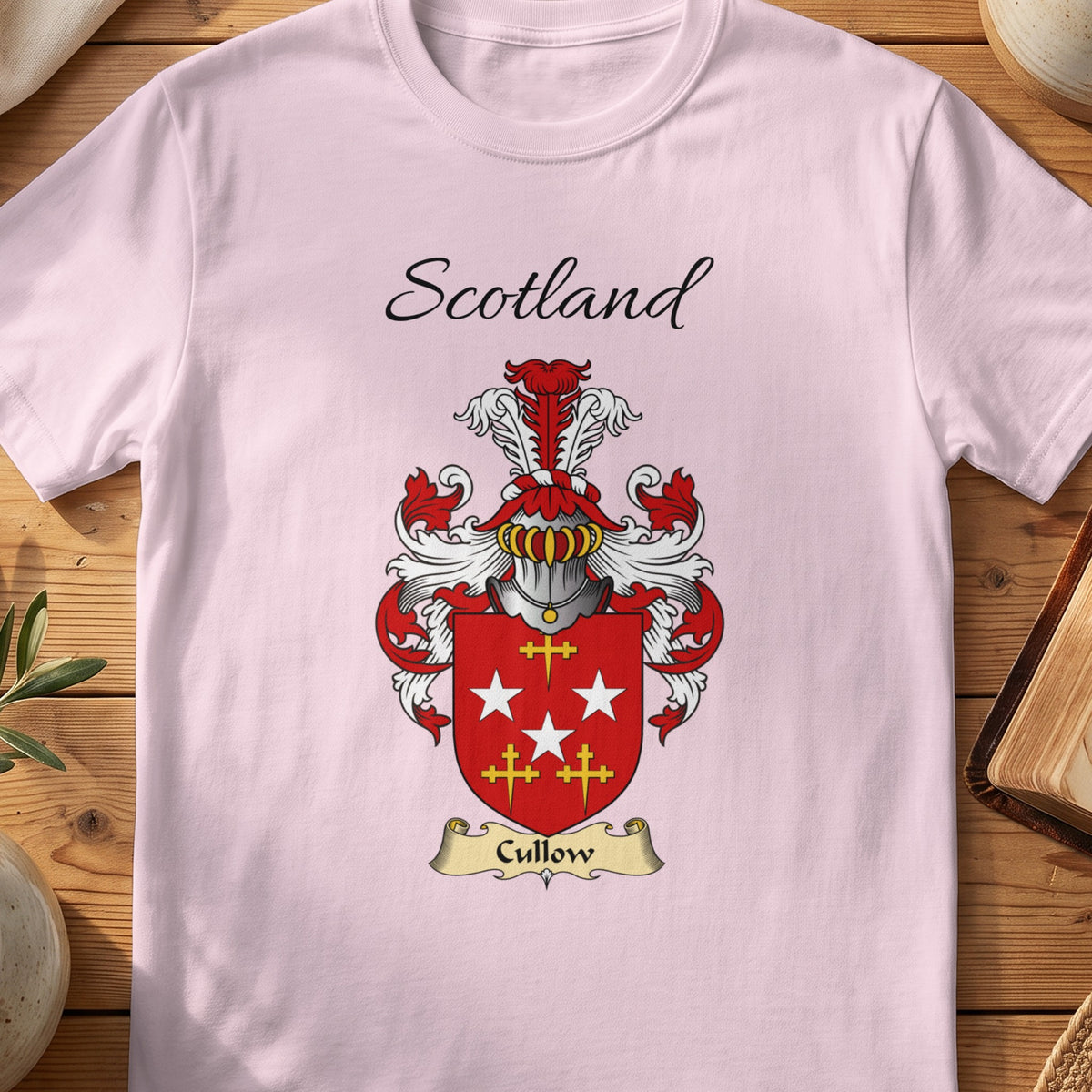 Light Pink Cullow Scottish family shield T-shirt featuring white stars and gold crosses on red