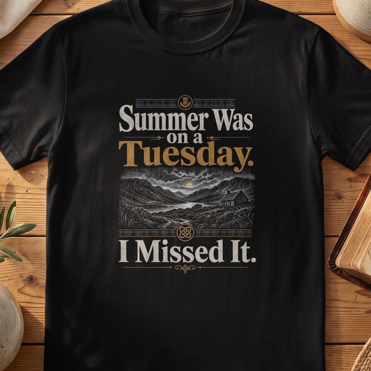 Black Gildan 64000 unisex T-shirt flatlay with Summer Was on a Tuesday Scottish graphic design