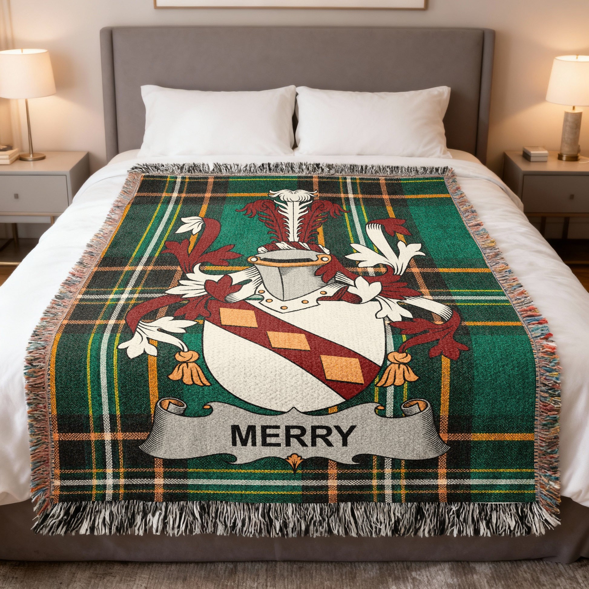 Green plaid blanket featuring a coat of arms with the name Merry.