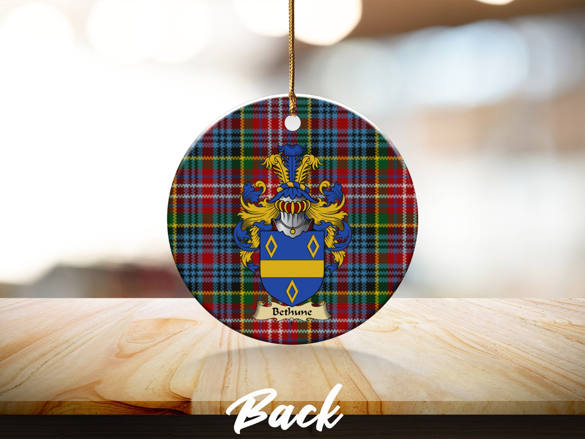 Round Bethune Scottish clan ornament with family crest on a Caledonia tartan background